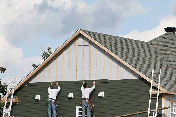 Professional Siding technician working in Caret, VA